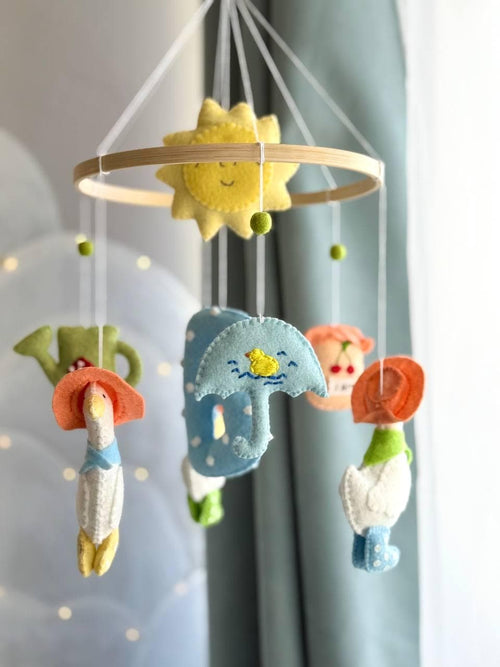 Handmade felt Personalized Goose Mobile hanging from a wooden hoop