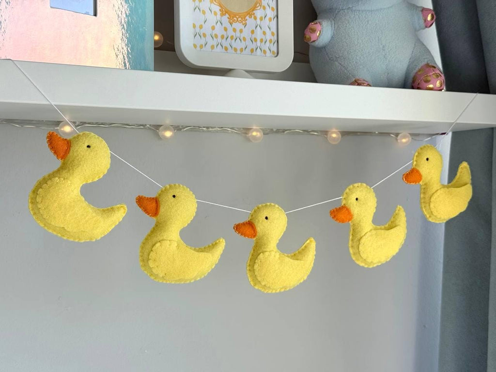 Yellow Ducks with Flowers Banner