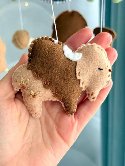 Handmade felt Seven Teachings Forest Mobile hanging from a wooden hoop