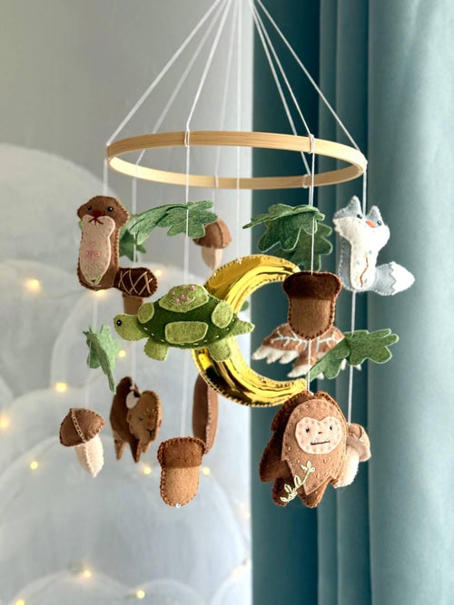 Handmade felt Forest Animals Baby Mobile hanging from a wooden hoop