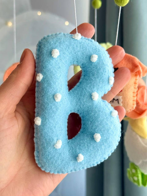 Handmade felt Personalized Goose Mobile hanging from a wooden hoop