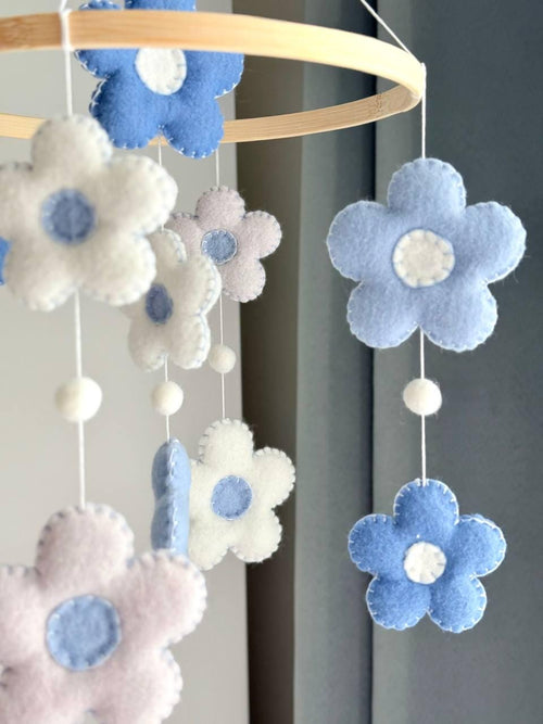 Handmade felt Daisy Baby Mobile hanging from a wooden hoop