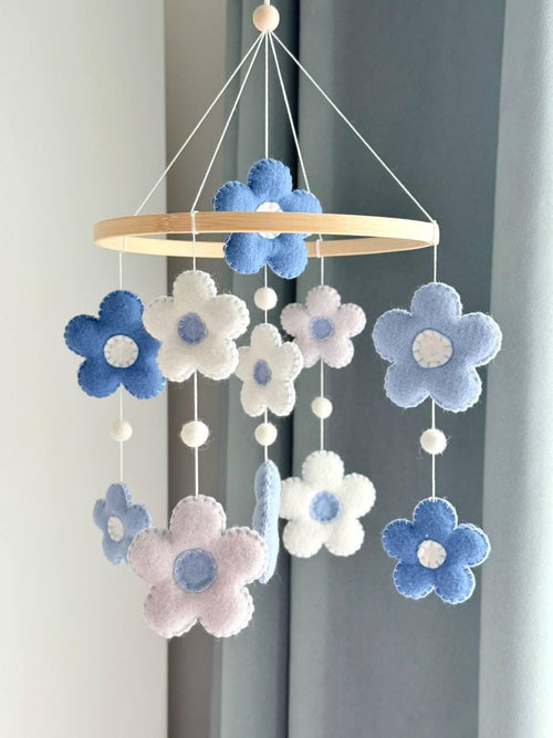 Handmade felt Daisy Baby Mobile hanging from a wooden hoop